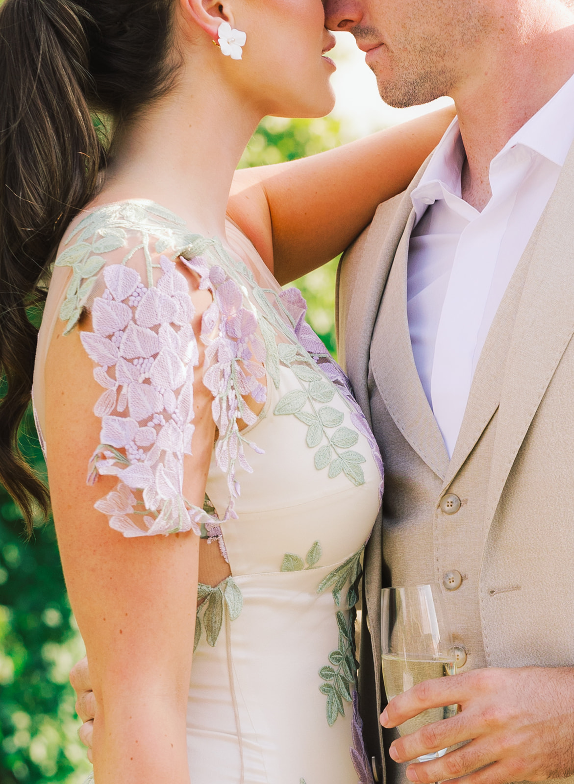 colorful floral embroidery on wedding gown