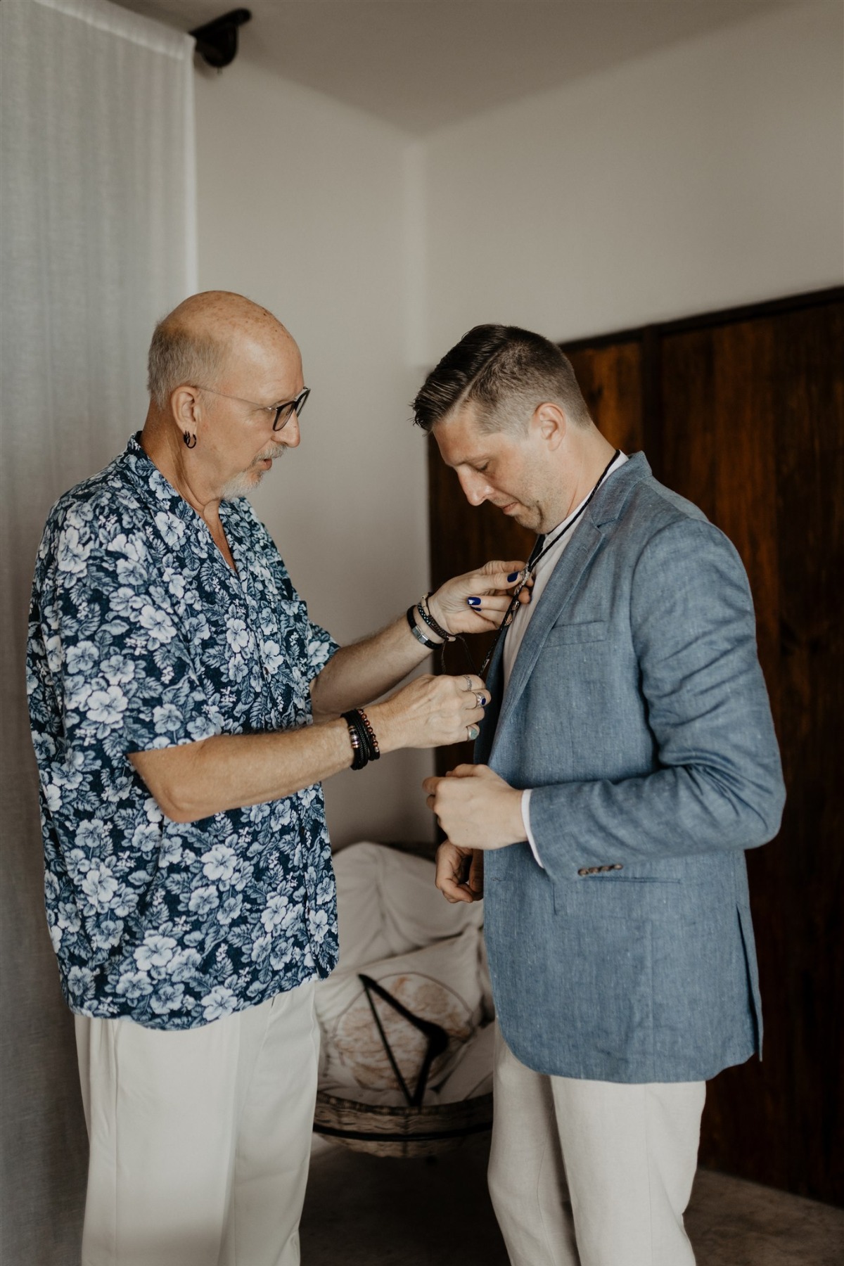 groom's look with bolo tie