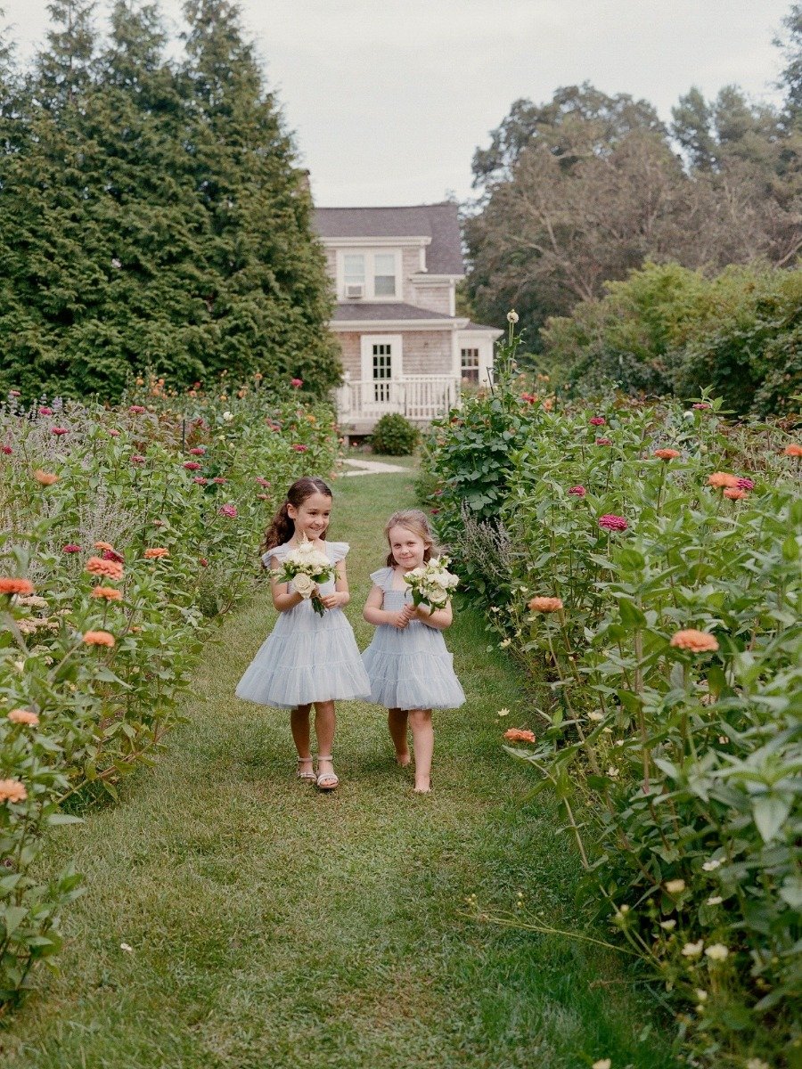 This wedding on martha's vineyard had an aisle made of wildflowers