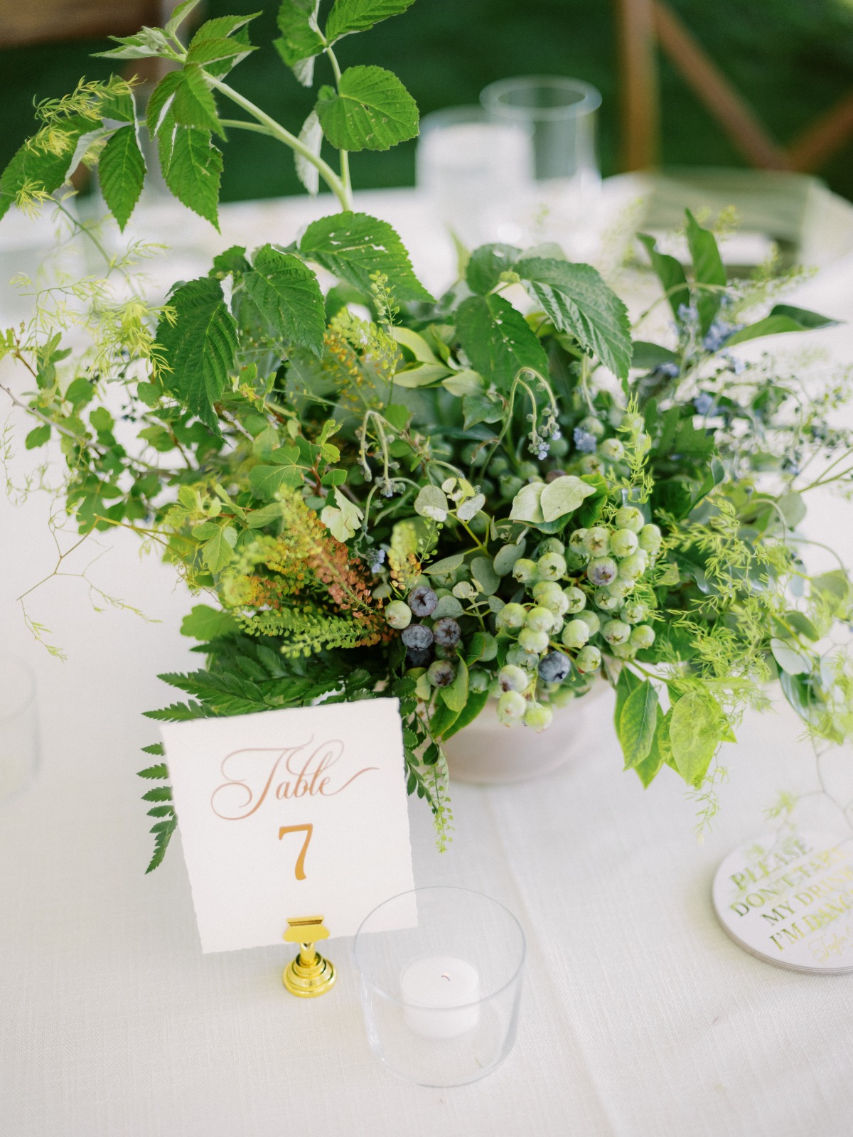 greenery and berries centerpieces