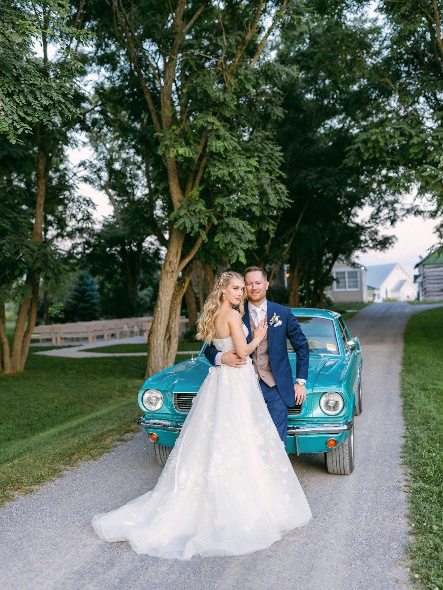 This couple drove to their luxe barn wedding in the 