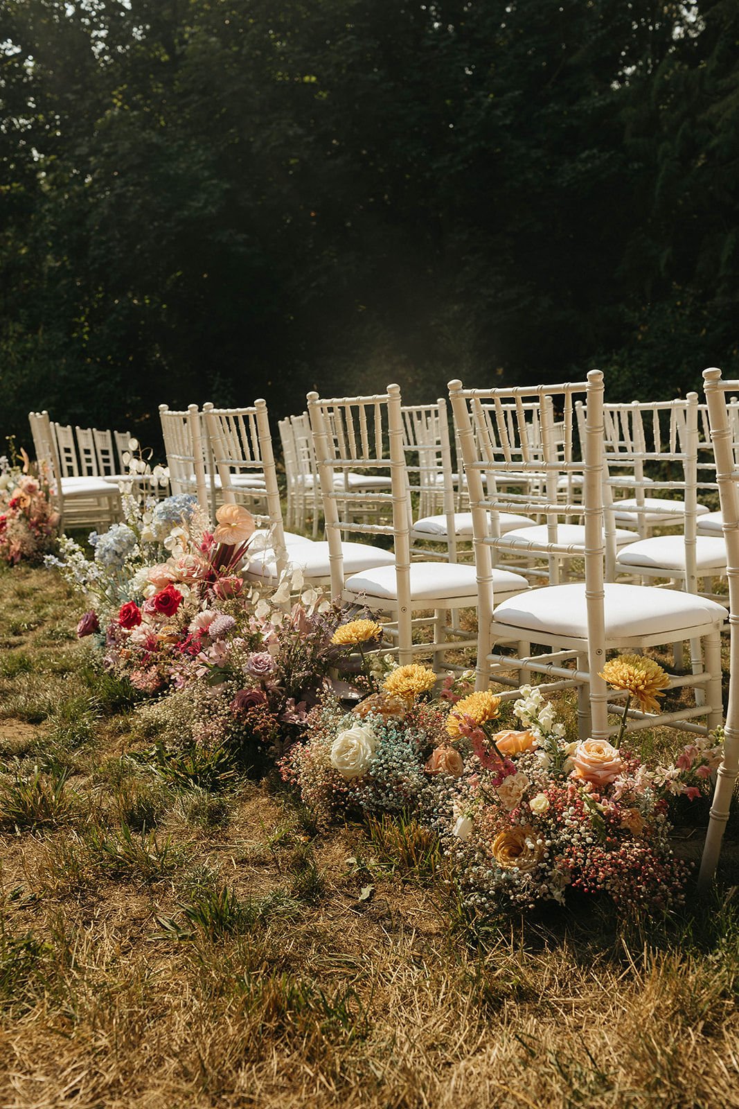 rainbow and baby's breath floral arrangements