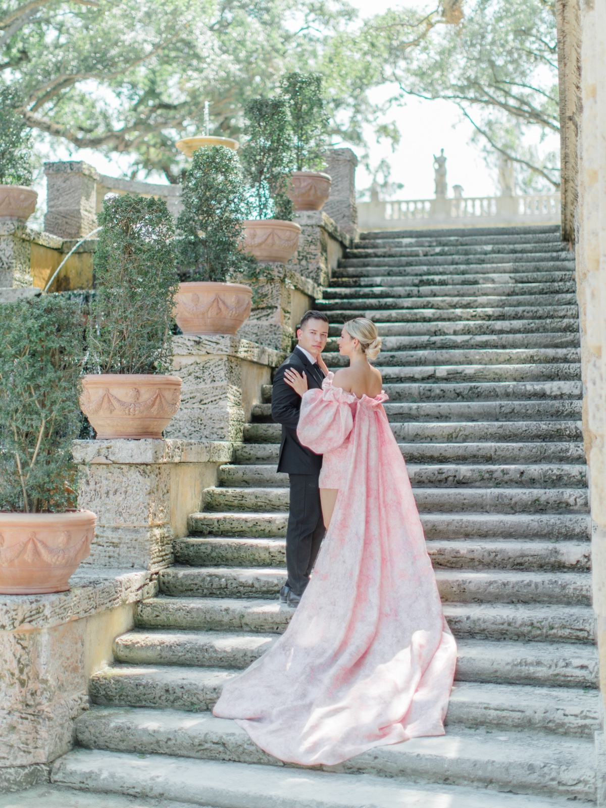 pink wedding dress with a cape