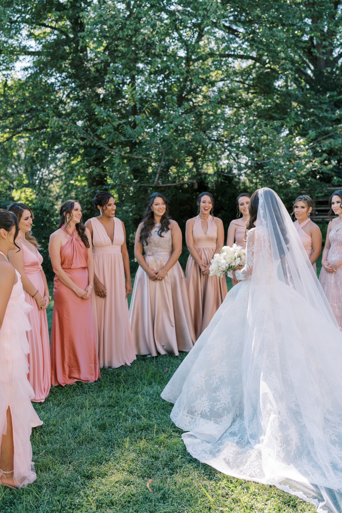 bridesmaids in mix and match pink dresses