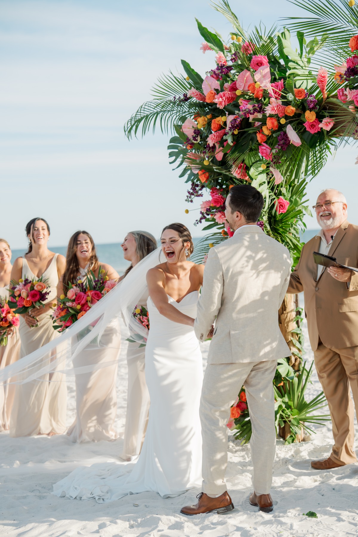 pink and orange tropical floral arch