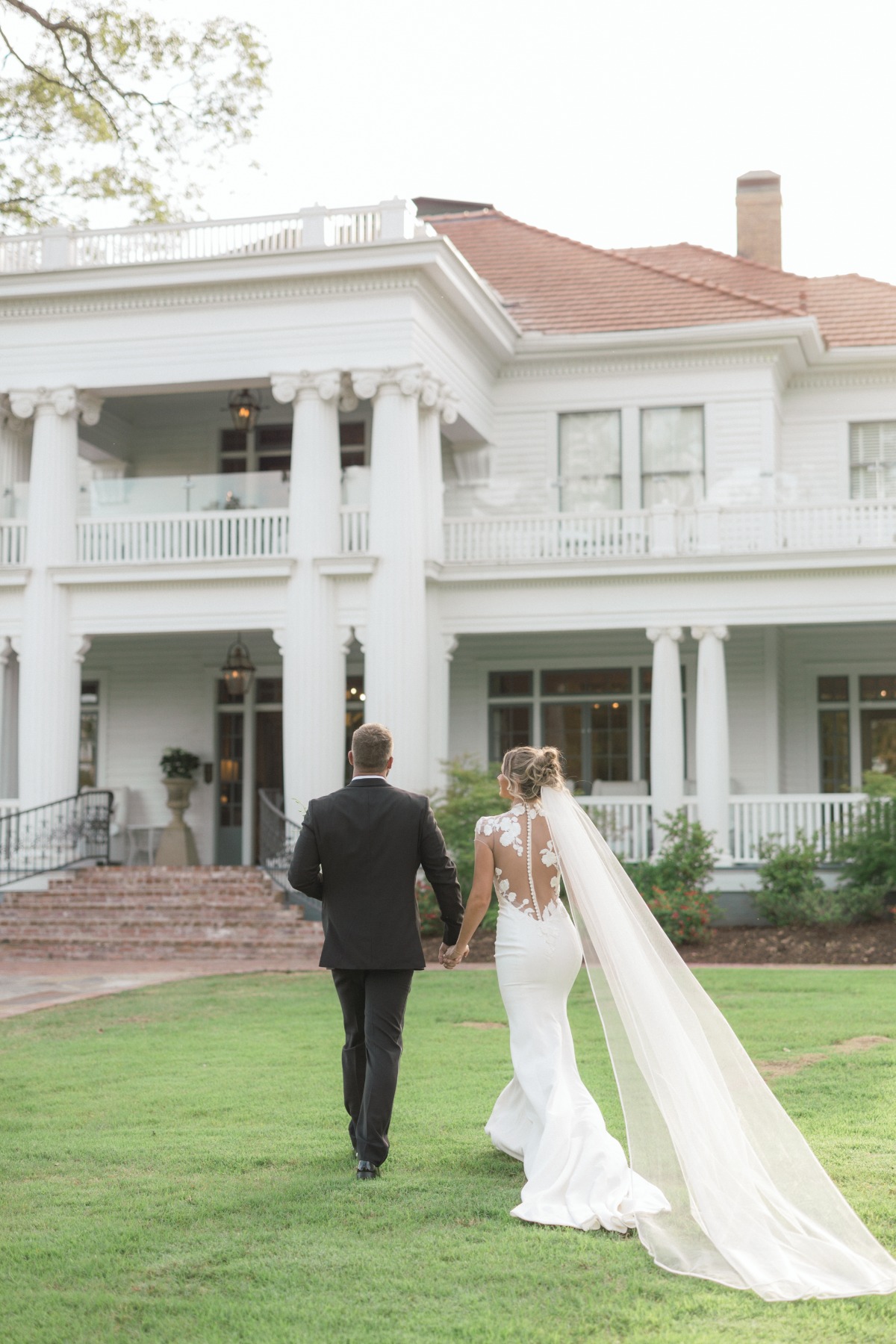 wedding gown with a high neck and a low back