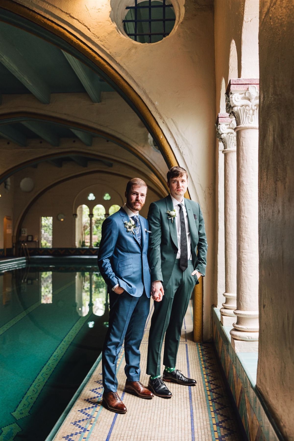 grooms in blue and green