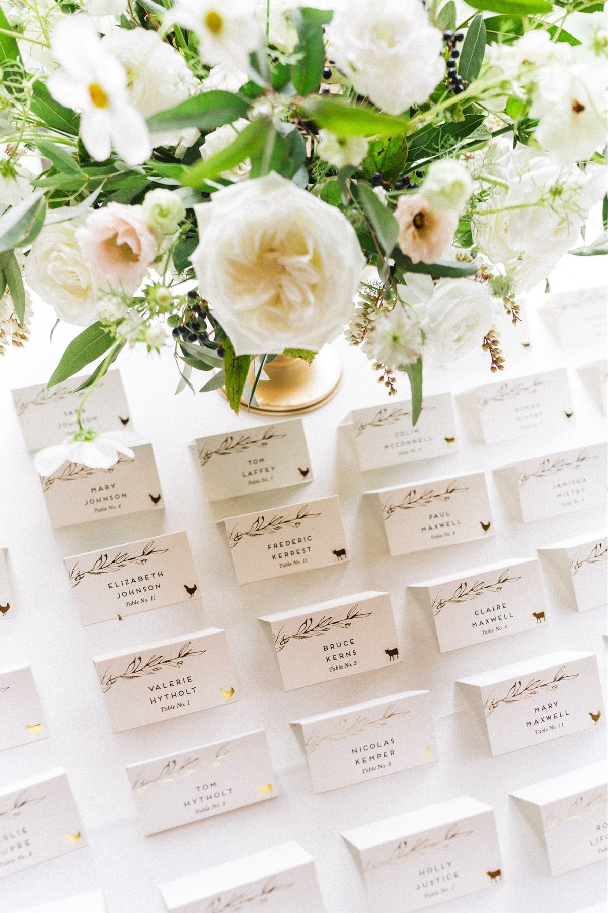 gold and white escort cards