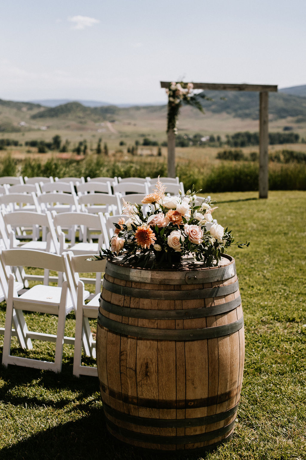 outdoor mountain wedding with blush florals