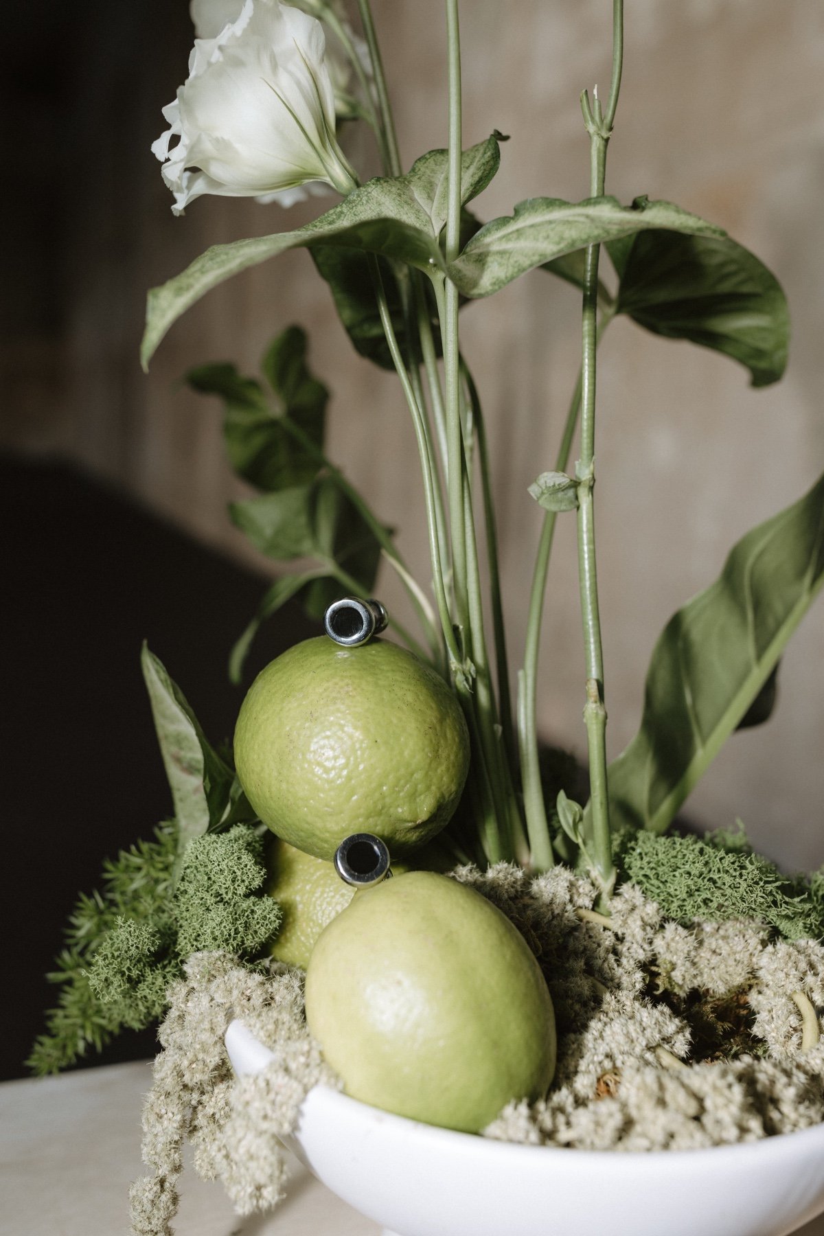 green and white tropical wedding florals