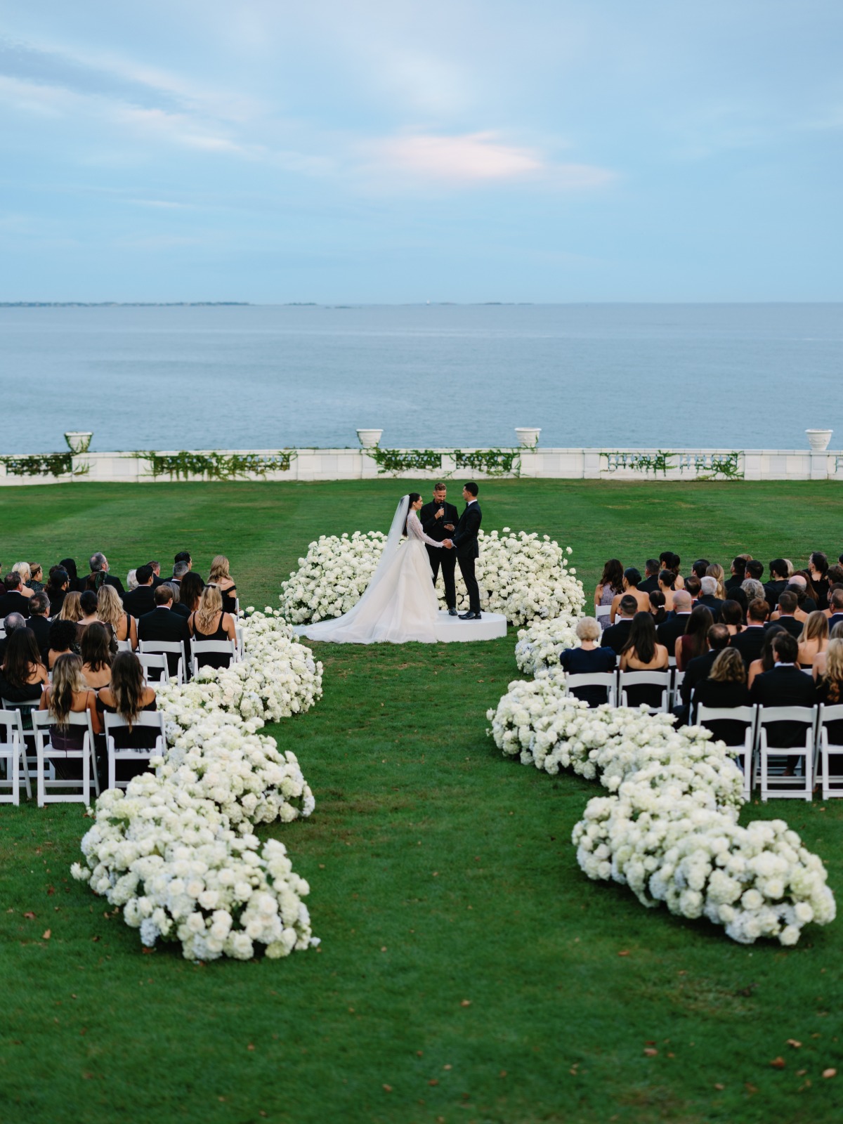 wavy aisle of white hydrangeas