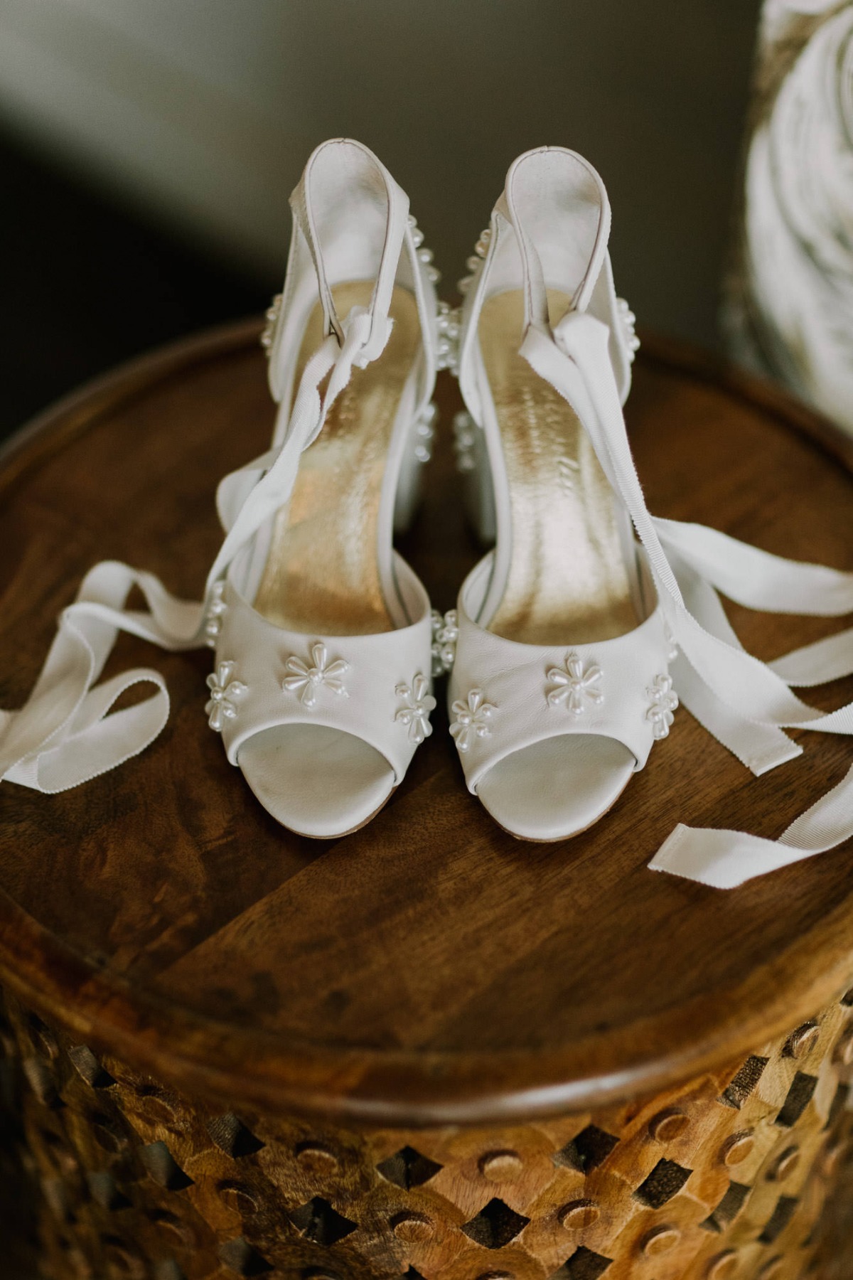 white sandals wedding shoes with ties and pearls