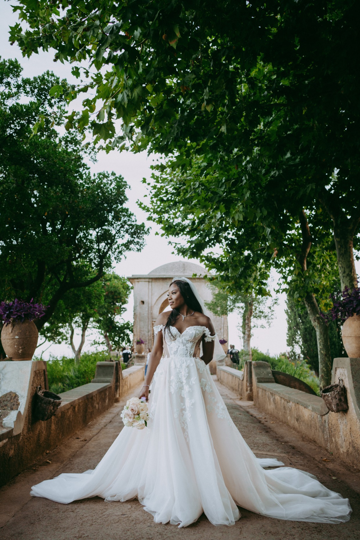 bride stands on bridge in galia lahav euphoria gown