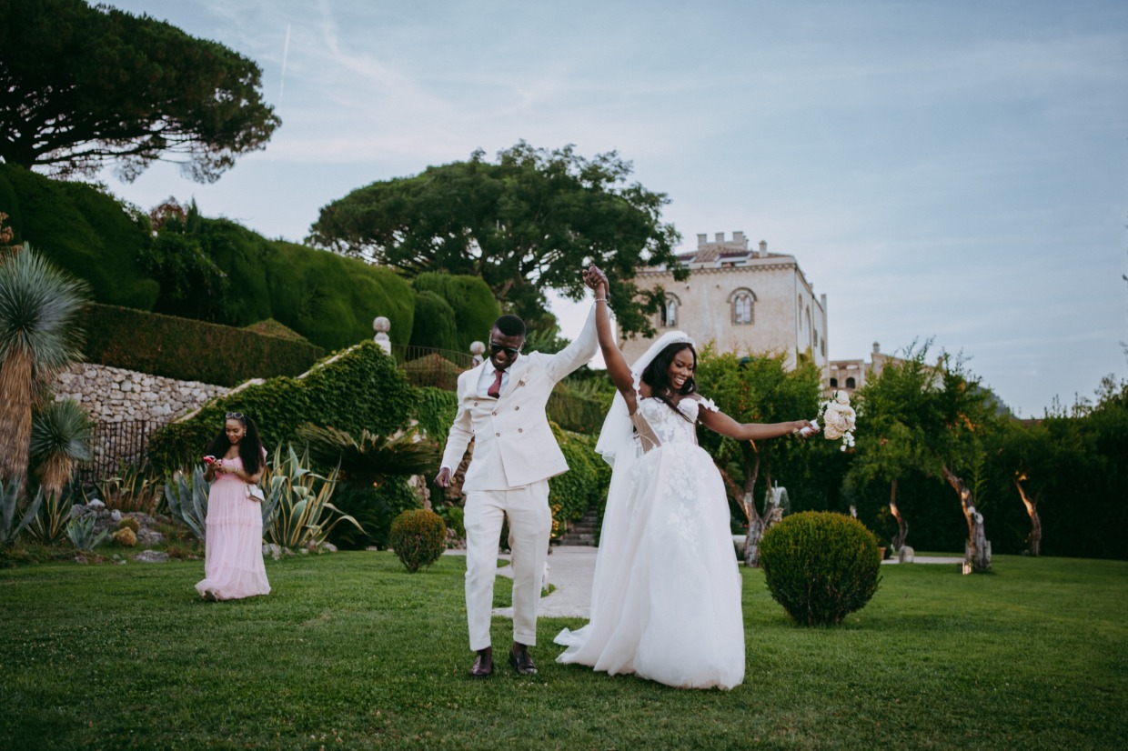 bride enters garden reception in euphoria by galia lahav