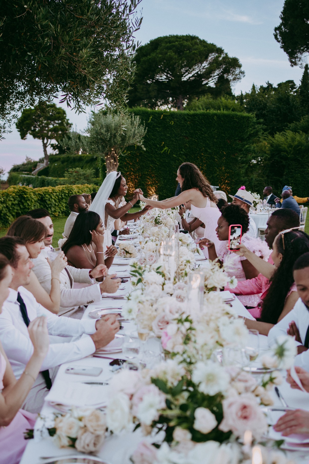 bride wearing euphoria gown by galia lahav to garden reception