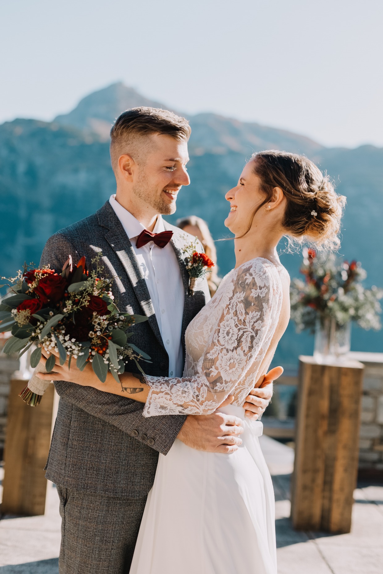 Couple with red bouquet