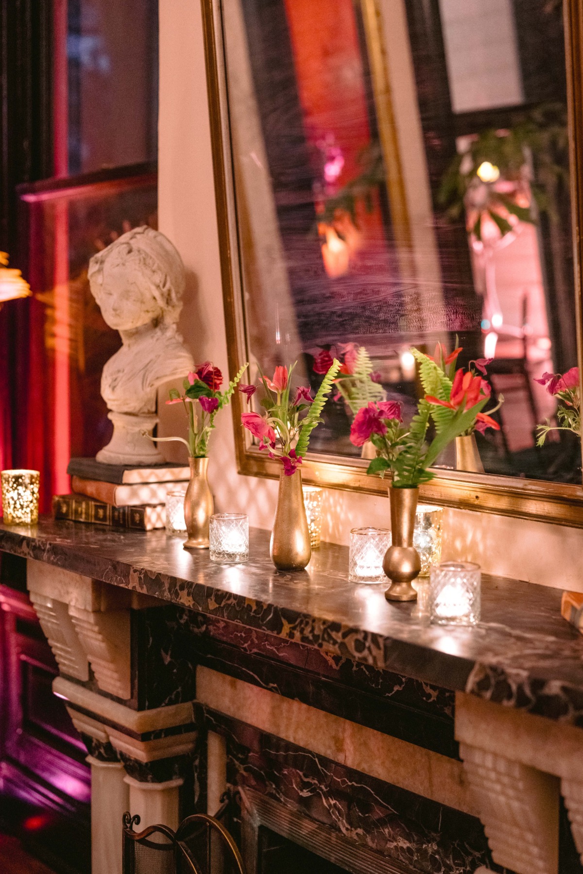 pink flowers in bud vases for wedding