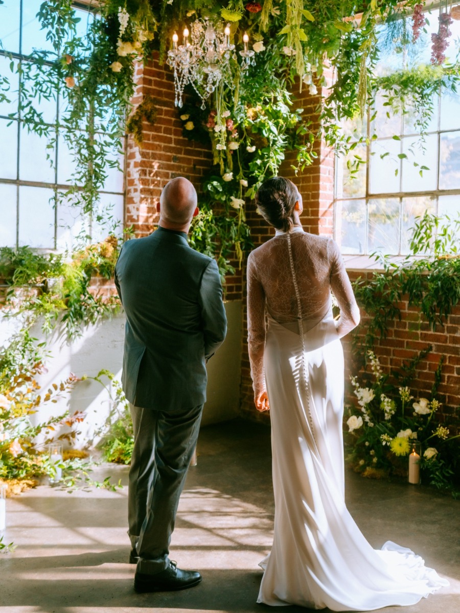 Industrial denver venue draped in enchanting greenery goodness