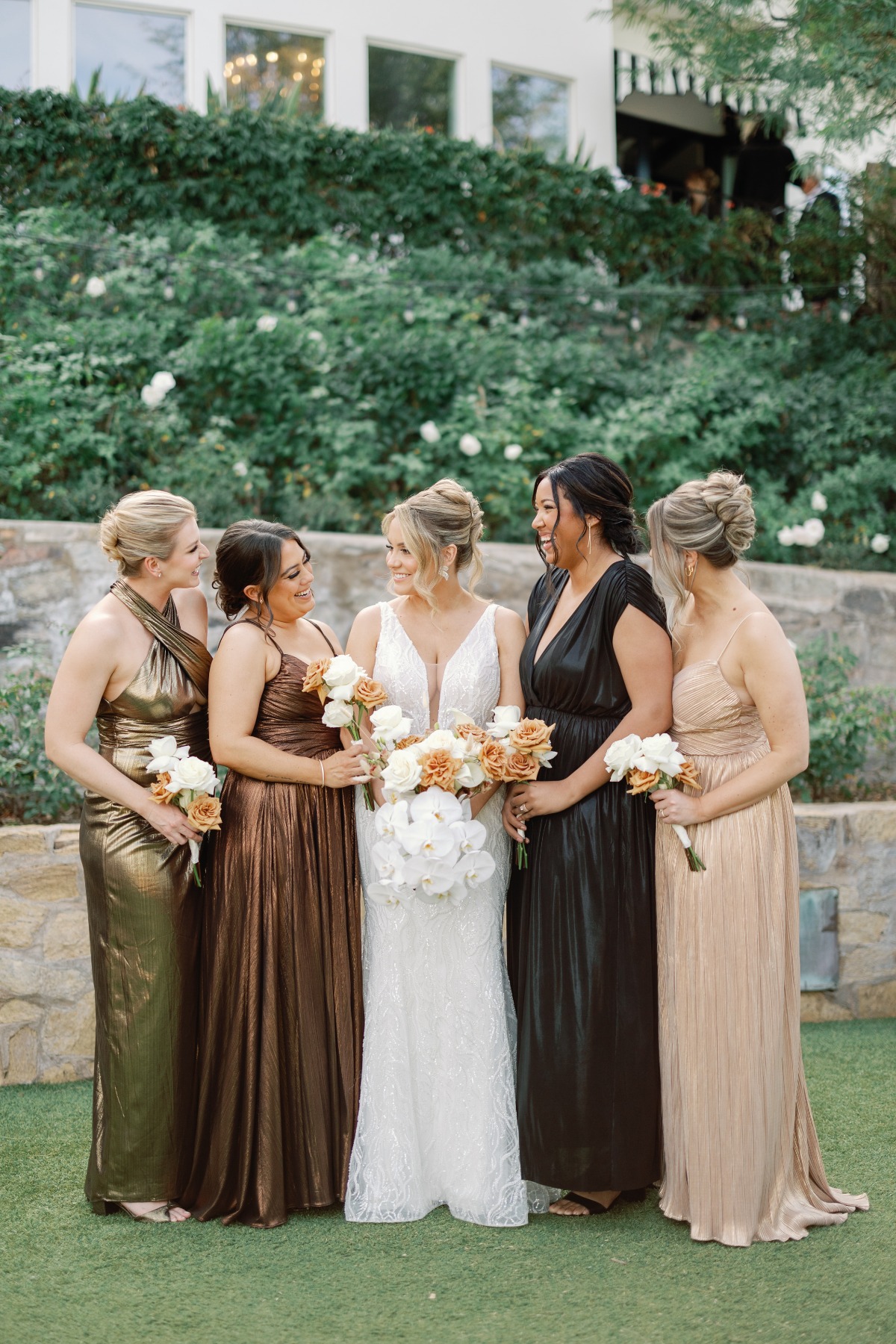 bridesmaids in earthtone dresses