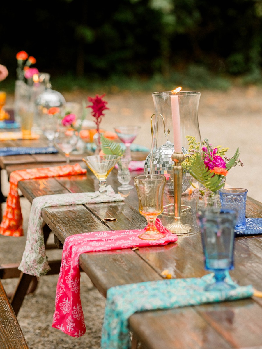 A cowboy disco wedding with a rainbow-hued paisley reception