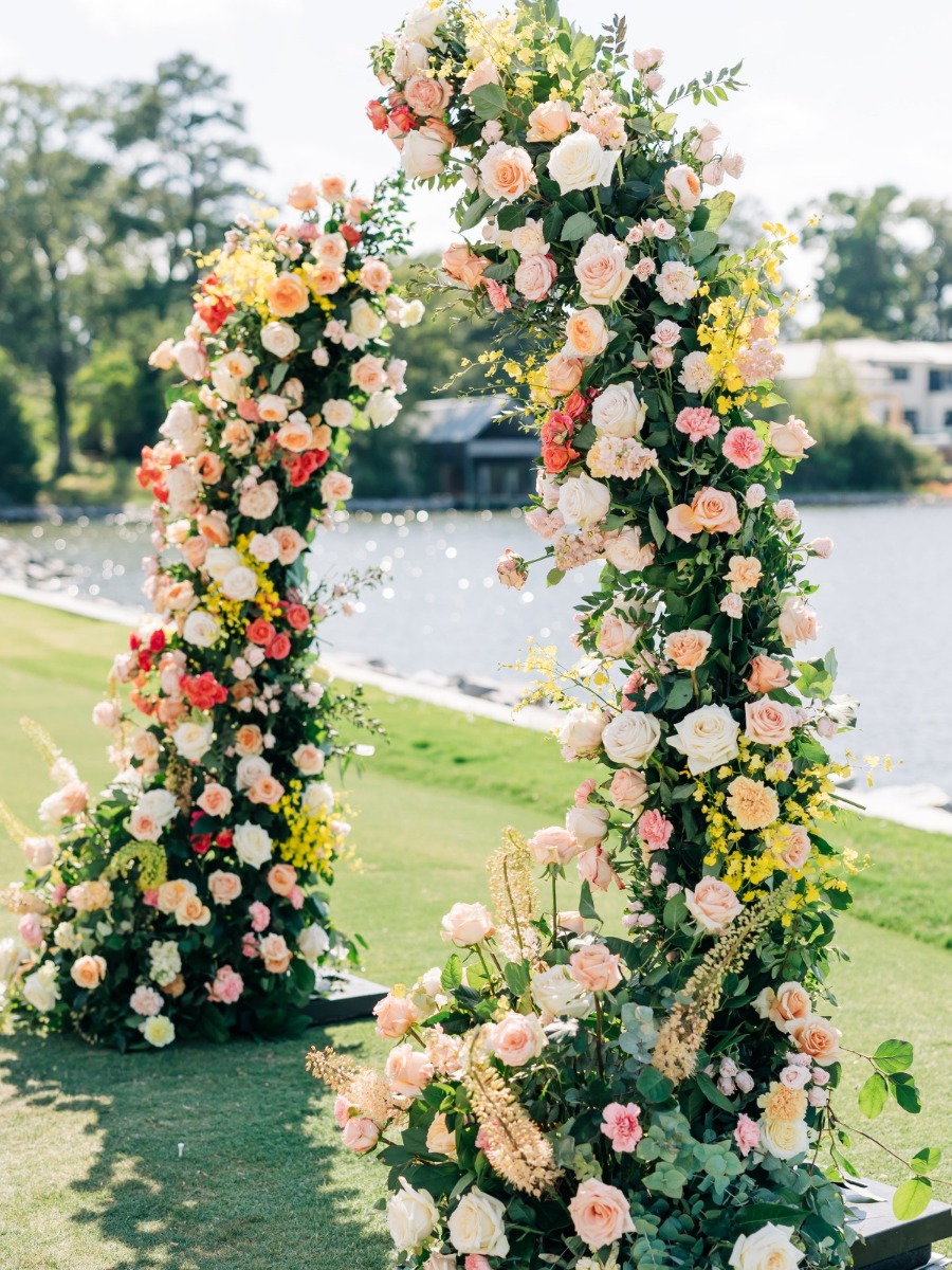 Sunset-hued wedding with a six-foot floral chandelier