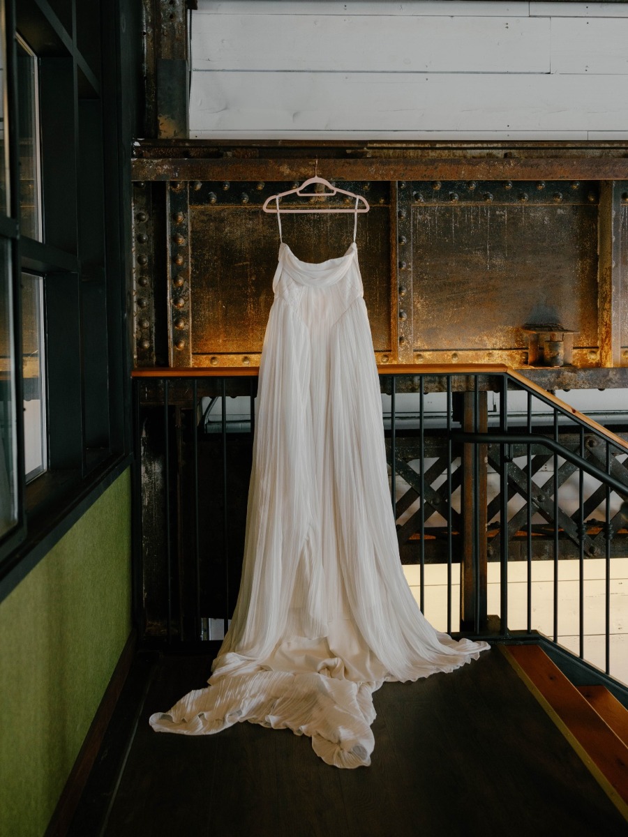 Vintage elegance and an industrial venue collide in this moody shoot